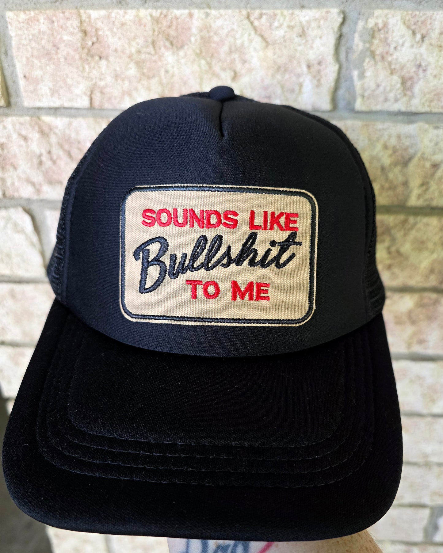 "Sounds like bullshit" trucker hat